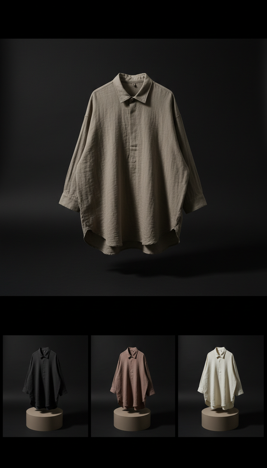 Japanese cotton oversized shirt, 3/4 angle product shots on matte taupe plinths against deep black backgrounds. Products...